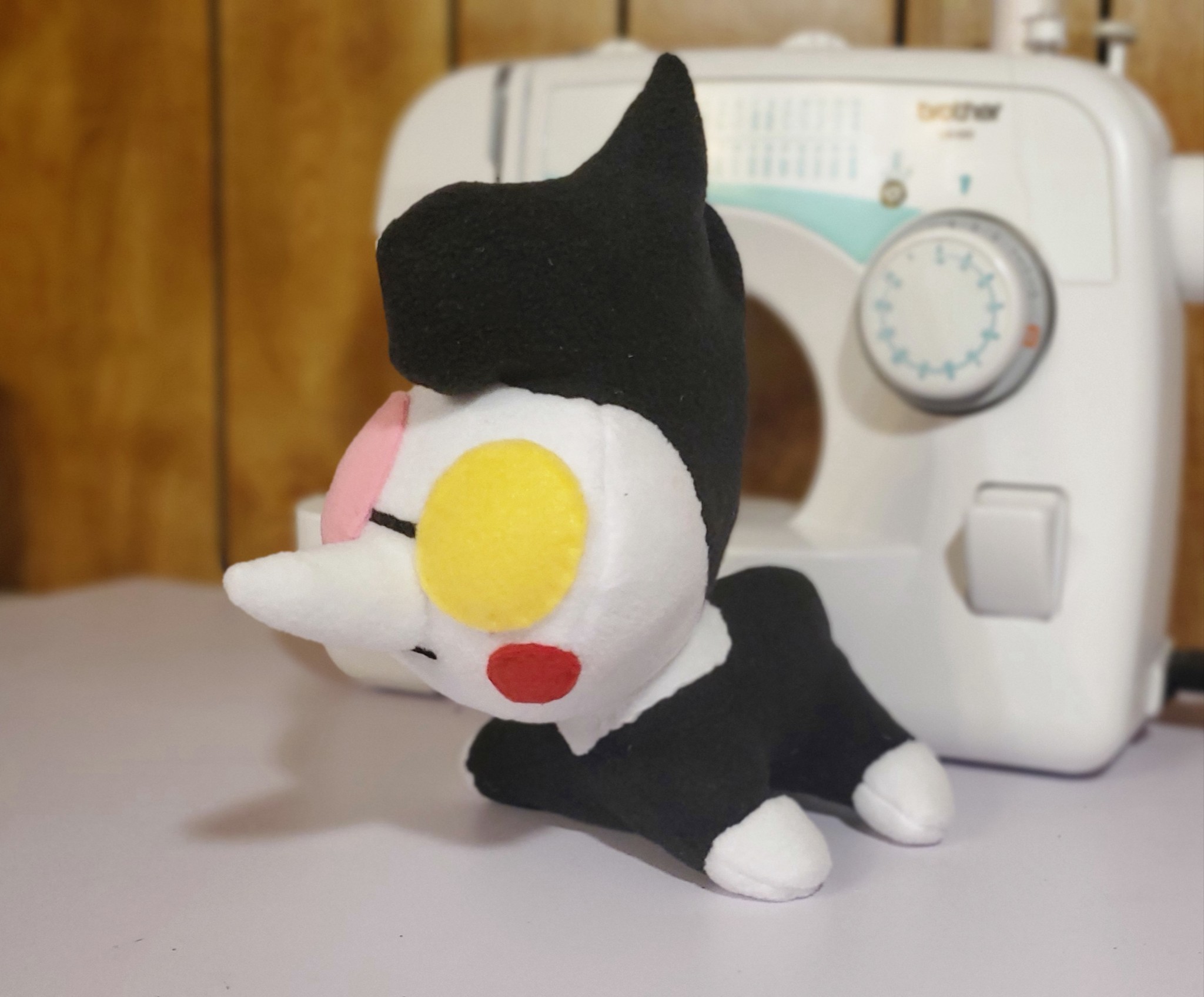 A photograph of a plush made by DayLikesCookies. The design is of a female vampire character.