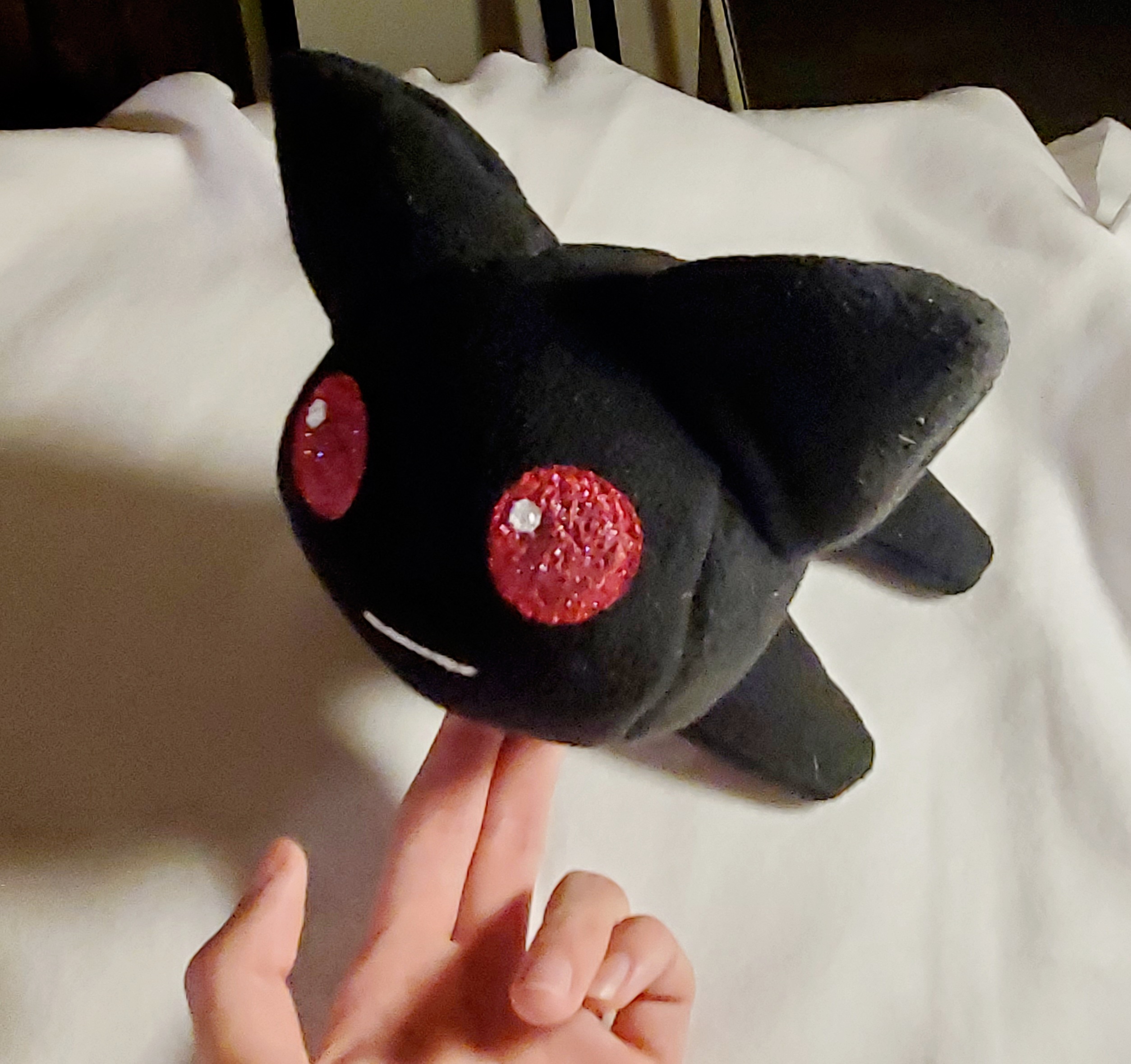 A photograph of a plush made by DayLikesCookies. The design is of a female vampire character.