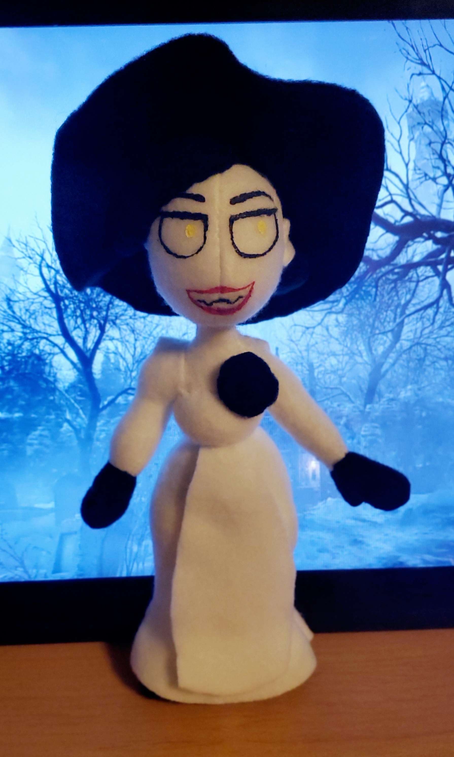 A photograph of a plush made by DayLikesCookies. The design is of a female vampire character.