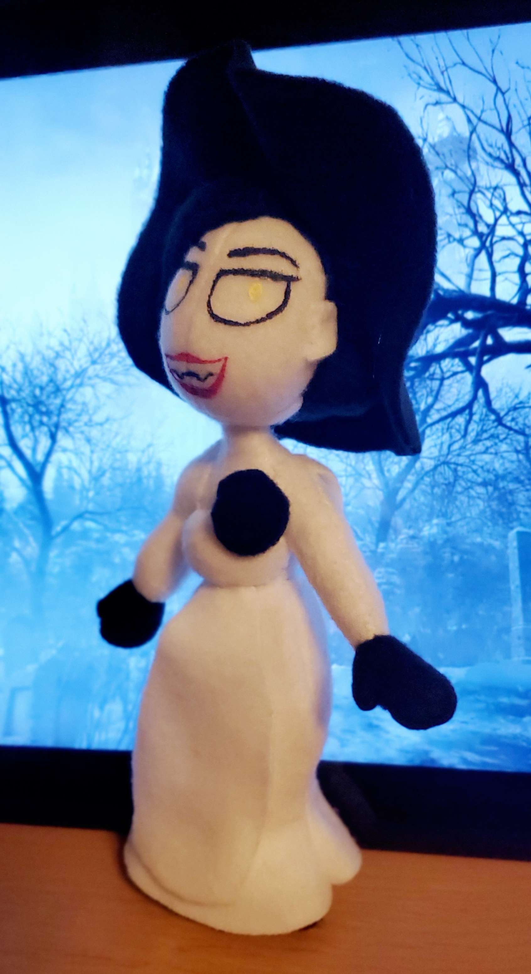 A photograph of a plush made by DayLikesCookies. The design is of a female vampire character.